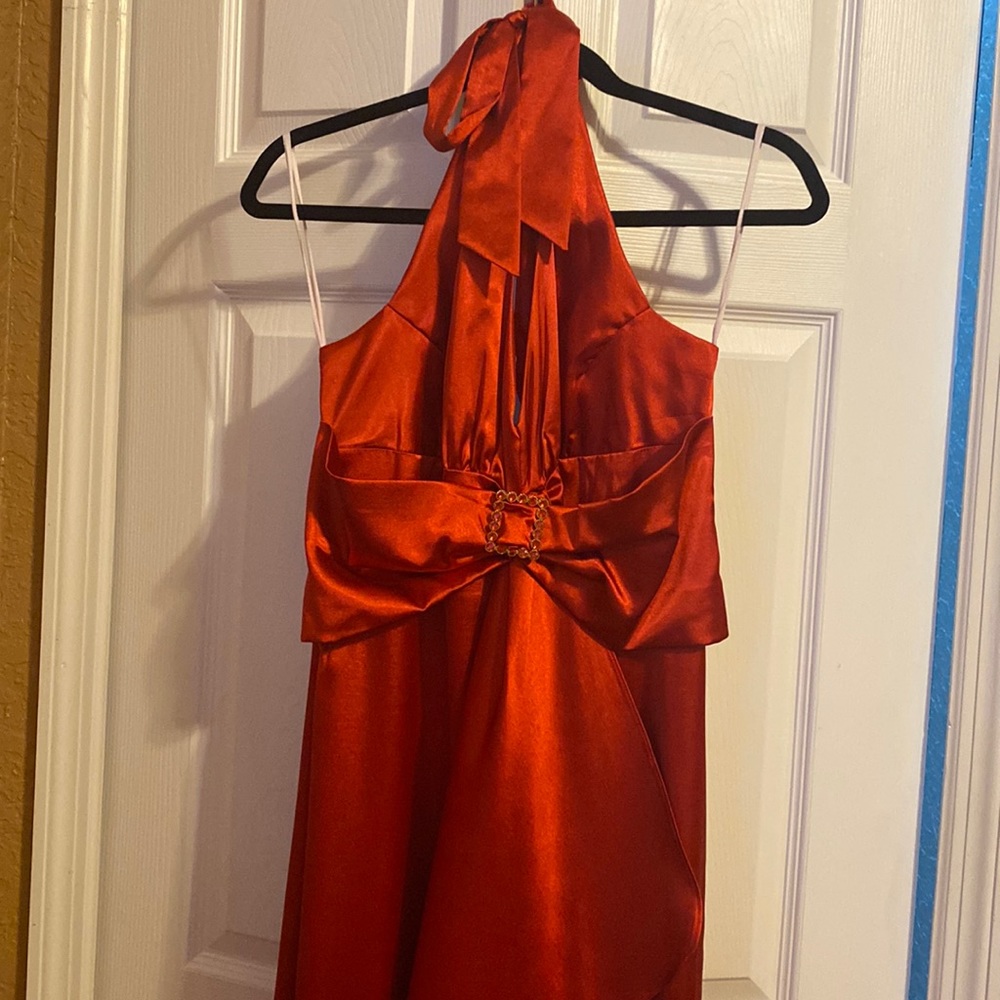 Red satin gown size 10/12 low back. Hidden zipper